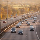 Article thumbnail: winter sun on sunday motorway traffic Essex England