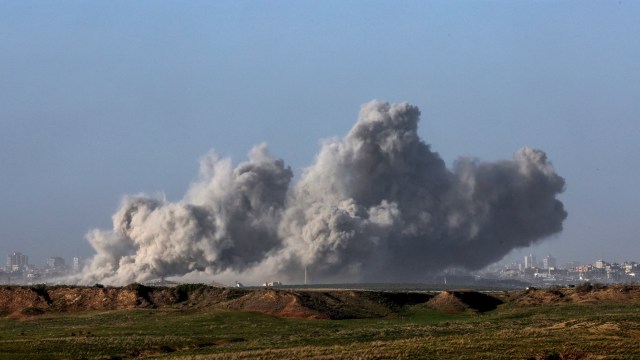 Article thumbnail: TOPSHOT - A picture taken from southern Israel bordering the Gaza Strip on December 22, 2023, shows smoke billowing following Israeli bombardment in the Palestinian territory amid ongoing battles with the Hamas militant group. (Photo by Jack GUEZ / AFP) (Photo by JACK GUEZ/AFP via Getty Images)
